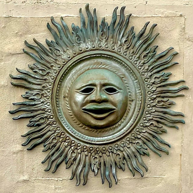 A spectacular vintage Sun wall sculpture. Chic patinated cast aluminum with beautiful attention to detail. Acquired from a...