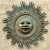 A spectacular vintage Sun wall sculpture. Chic patinated cast aluminum with beautiful attention to detail. Acquired from a...