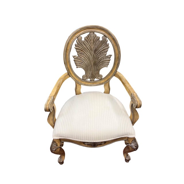 This elegant set of six dining chairs—comprising four side chairs and two armchairs—beautifully reflects French...