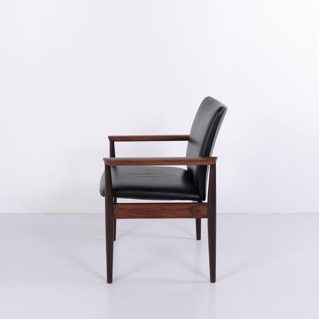 Finn juhl diplomat 209 armchair by france & son in rosewood and black leather. Danish design classic from the 1960s. —...