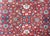 A wonderful mid-20th century Persian Varamin rug with an all-over mirrored trellis floral pattern with large-scale flowers...