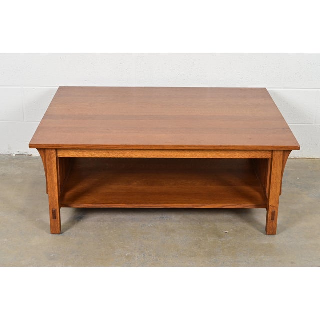 An exceptional Mission or Arts & Crafts style solid quarter sawn oak two-tier spindle coffee table By L. & J.G. Stickley...