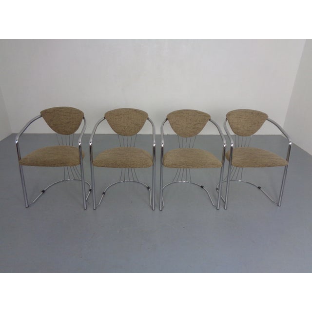 Graceful, Italian dining room chairs from the 1980s.