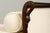 An elegant early 19th-century French Empire daybed sourced from Paris, France. Crafted from solid mahogany, it features...