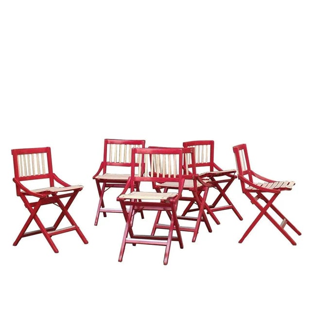Garden set consisting of 6 folding chairs Mod. "152", 1960s Fratelli Reguitti production, red and white lacquered wooden...
