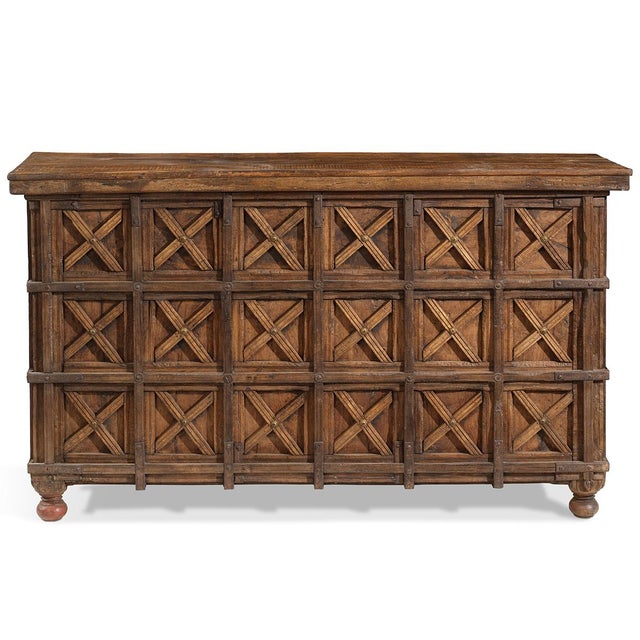 Gujarat, mid 20th century A distinguished vintage Indian storage chest from western India, handcrafted in solid teak wood...
