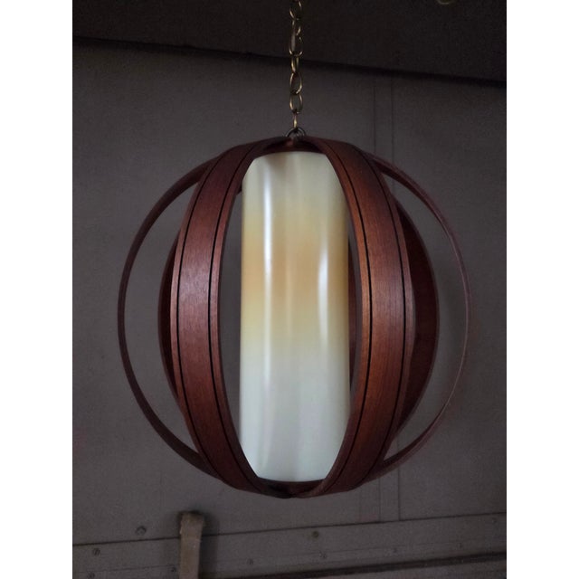 1960s bentwood globe pendant light in walnut finish. Acquired from a time capsule home in Roanoke Rapids, NC. Removed from...