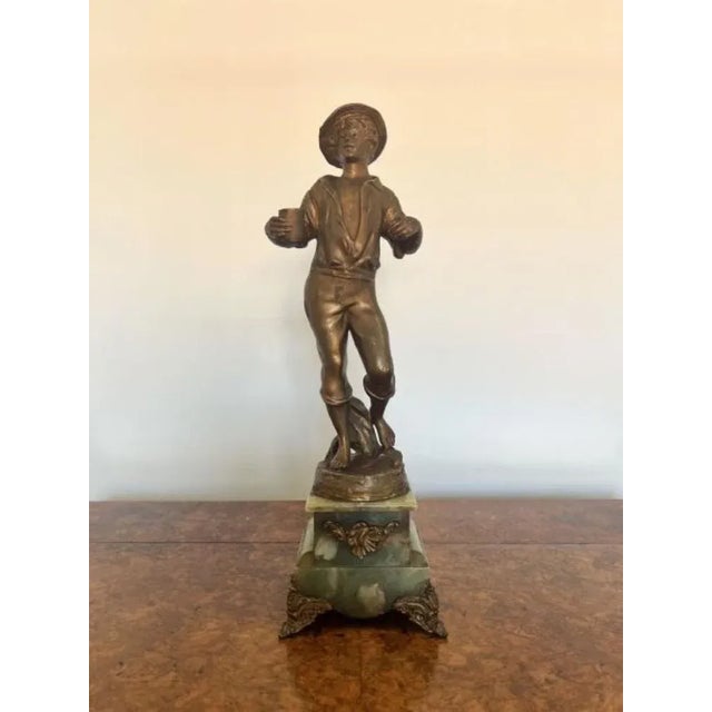 Stunning quality antique Victorian French clock garniture having a quality antique Victorian clock garniture with...