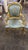 An elegant French Louis XV-style armchairs, beautifully combining an ornate gold-finished carved wood frame with...