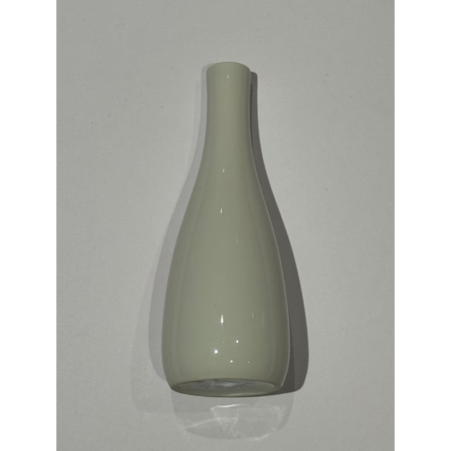 Infuse serene minimalist style into your interior styling with this authentic mid-century white porcelain tokkuri (sake...