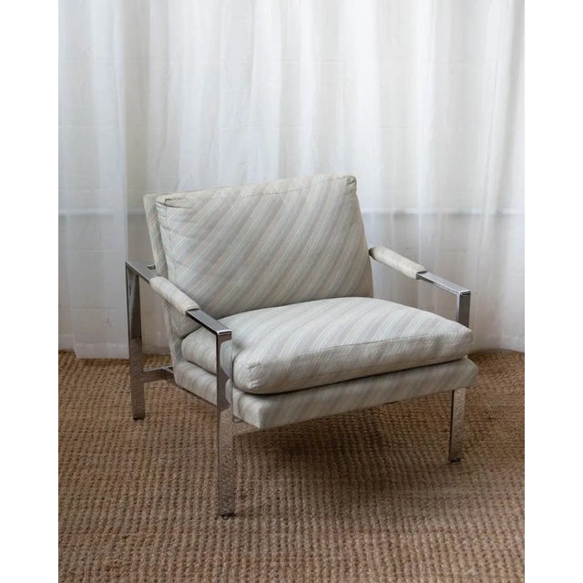 Light pastel stripes, slim bar frame and a very comfortable place to sit. Designed by Milo Baughman for Thayer Coggin...