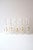 A beautiful set of five (5) highball cocktail glasses with etched design and gold dot detail, in the Midcentury Modern...