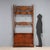 Wall-mounted coat rack in walnut-stained beech. The openwork bands feature floral, leafy, scroll, and curlicues, with a...