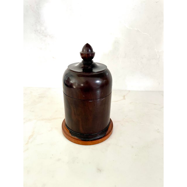This stunning two tone treen canister box is made from Lignum vitae wood which is grown in the Caribbean and South...