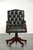 This beautiful green English-style Chesterfield office chair is made of cowhide leather. It is height-adjustable, features...