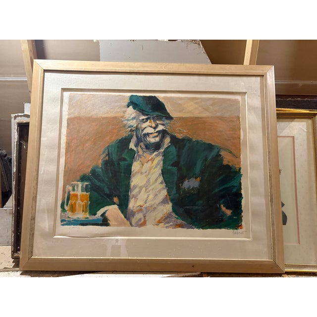 A lithograph by Argentinian artist, Aldo Luogo, of an old man known as The Hawk drinking beer. This is Luongo's archetypal...