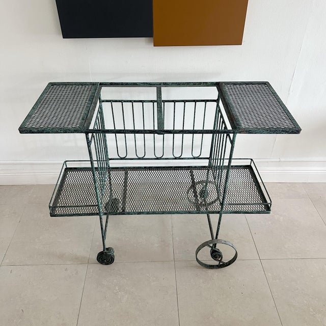 Maurizio Tempestini for Salterini wrought iron mid-century bar cart with vintage applied verdigris finish. Great vintage...