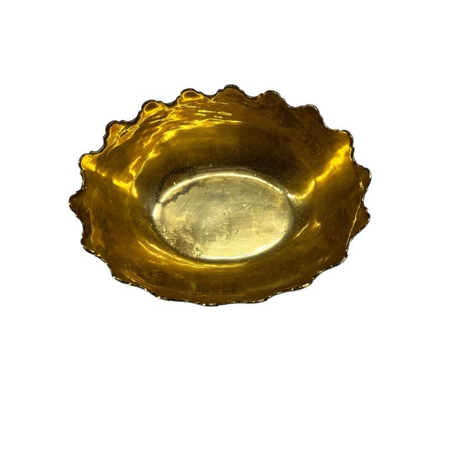 Vintage claw foot, scalloped edge oval cachepot. 8.5” w x 6.5” d x 4” h. Some residue from previous floral arrangements.