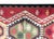 A bold and beautiful late 20th century Afghani kilim runner with five large diamond medallions, each with large stylized...