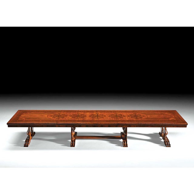Handcrafted in Italy from solid walnut, this extension dining table features a richly detailed top inlaid with mahogany,...