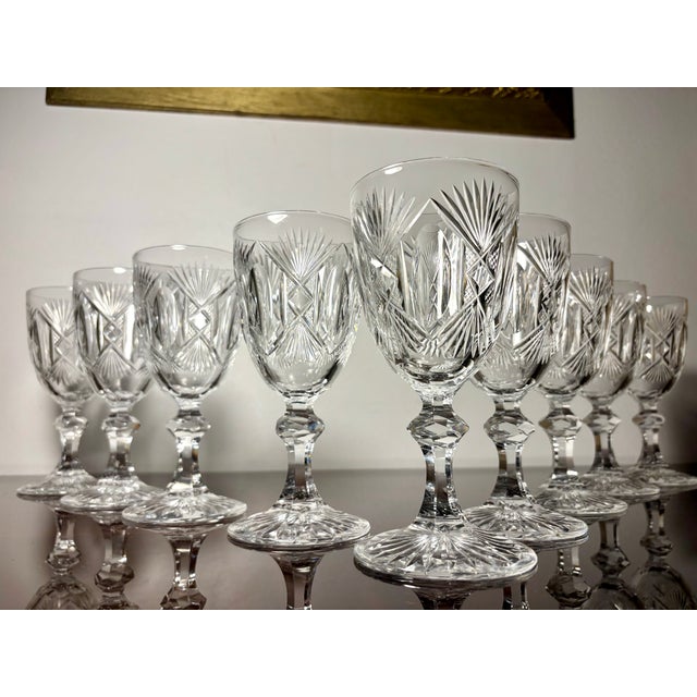 A distinguished set of nine hand cut crystal glasses attributed to Saint Louis, dating to the mid to late nineteenth...