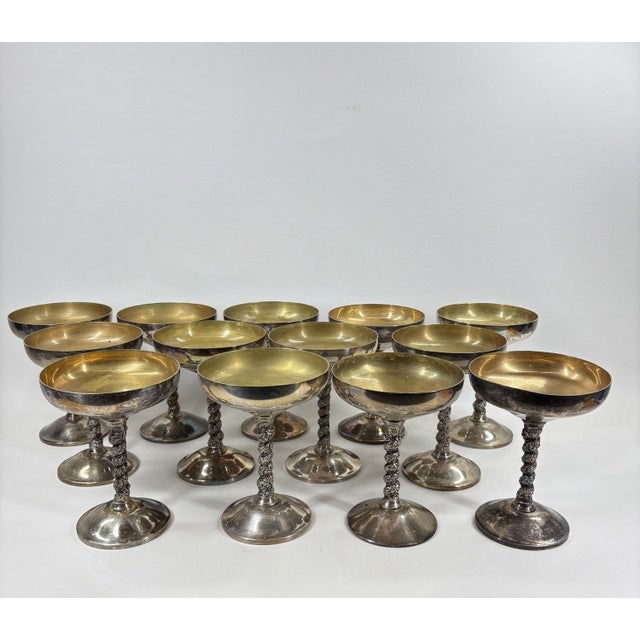 Vintage Spanish Silver-Plated Champagne Goblets - Set of 13 This collection of 13 vintage Spanish silver-plated champagne...