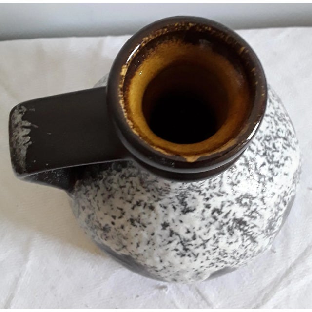 Vintage German Fat Lava Style Brown & Gray Ceramic Vase, 1970s, in Good conditions. Designed 1970 to 1979 This piece has...