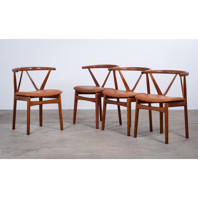 Set of 4 rare dining chairs, model 255, designed by Henning Kjærnulf and produced by Bruno Hansen in Denmark in the 1960s....