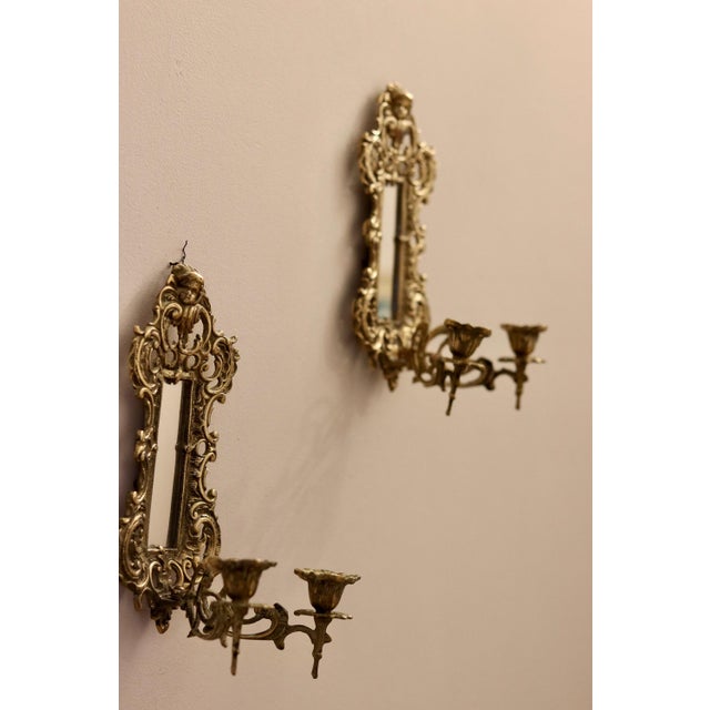 Elegant Swedish brass candle wall sconce with mirror. Sold as a set, and individual complete with measurements provided...