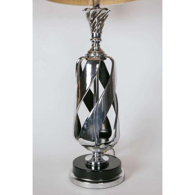 These tall, twisted table lamps are made of chrome. European Plug (up to 250V).The wiring of this item may be original and...