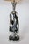 These tall, twisted table lamps are made of chrome. European Plug (up to 250V).The wiring of this item may be original and...