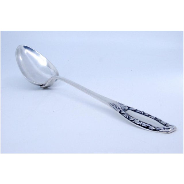 Silver Rice and Serving Spoon with Reliefs and Medallion Handle For Sale - Image 3 of 8
