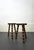 Pair of French tripod stools in solid wood. Highly sculptural and robust turning in the style of Charles Dudouyt. They...
