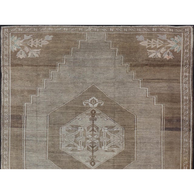 Tribal Turkish Vintage Kars Rug in Brown Background With Gray and Hints of Green For Sale - Image 3 of 14