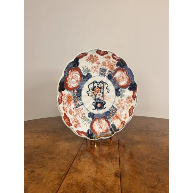 Quality antique Japanese imari plate, having a quality antique Japanese imari plate decorated with a basket of flowers to...
