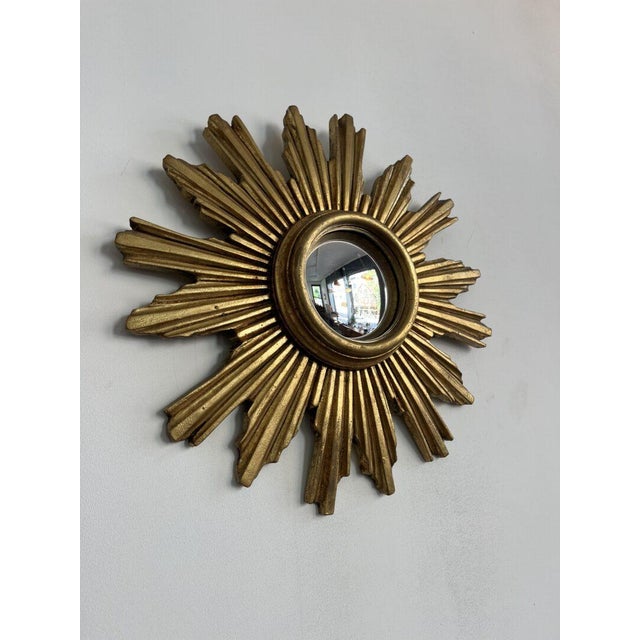 The beloved sunburst mirror, to brighten up your interior. This particular item features a convex mirror, which is harder...