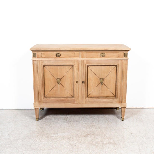 Elegant yet quietly commanding, this early 20th century French Louis XVI style buffet, circa 1900, blends classical...