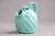 Michael Andersen pineapple-shaped jug with spout and handle. Light green glaze. The jug is in good condition and...