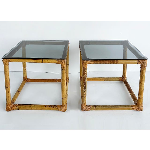 Pair of Mid-Century Rattan Side Tables, Glass Top. Offered for sale is a pair of vintage Mid-Century cube side tables made...