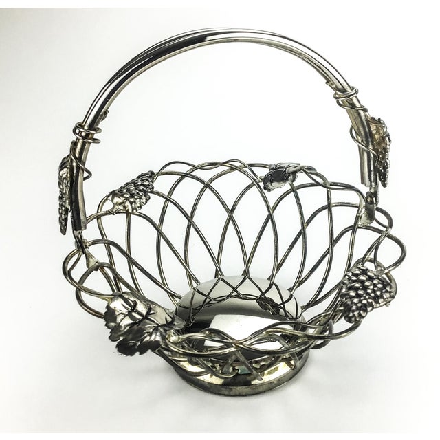 Stunning little basket with working handle. Has not been polished so expect a nice surprise when you decide to make it...