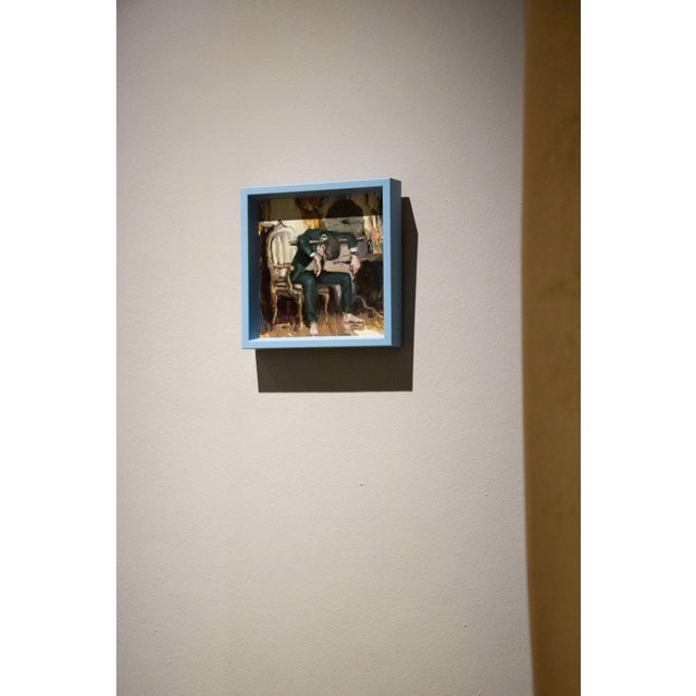 Contemporary Something in the Way by Nadezda | Oil on panel of a man slumped in a chair with a gramophone nearby For Sale - Image 3 of 5