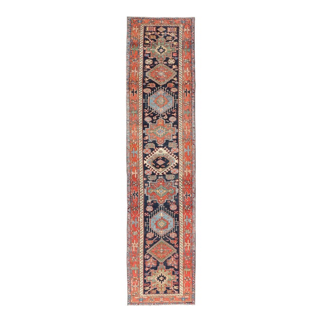 Antique Heriz Serapi Runner With Colorful Highly Stylized Medallion Design For Sale