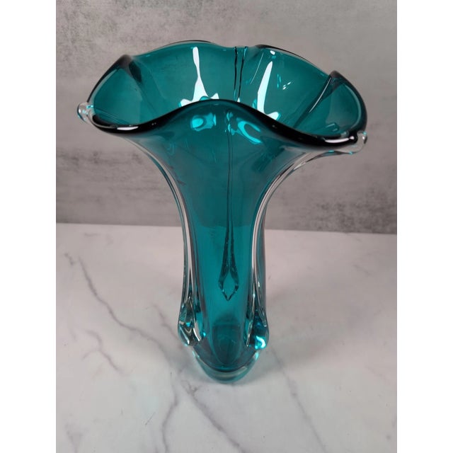 Make a striking statement with this stunning vintage **Timothy E. Landers** hand-blown Sommerso art glass vase. Expertly...
