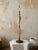 Vintage floor lamp with unique sculpted wood pole and solid brass hardware.