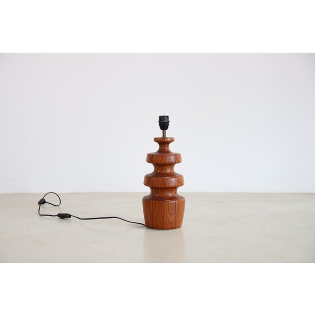 Beautiful table lamp by Yngve Ekstrom for Lystella from the 1960s. The pine wood base has a lovely organic shape and...