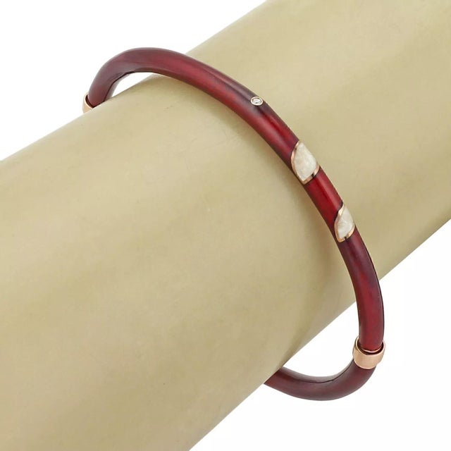 This elegant authentic bangle is from Nouvelle Bague, it is crafted from 18k white gold & sterling fully covered with a...