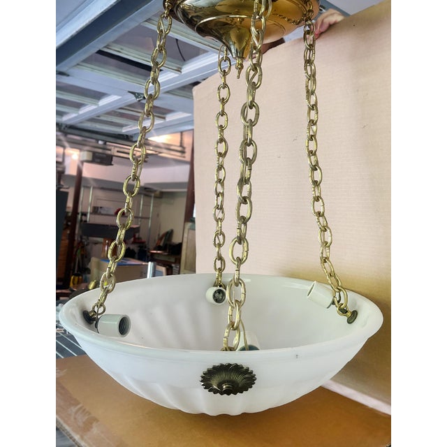This 20th Century plafonnier or ceiling pendant is styled after the Art Nouveau Jefferson moonstone lamps. It consists of...