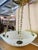 This 20th Century plafonnier or ceiling pendant is styled after the Art Nouveau Jefferson moonstone lamps. It consists of...