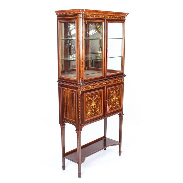 This is a truly magnificent antique Edwardian Goncalo Alves and marquetry inlaid upright display cabinet by Edwards &...