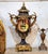 Make a statement with this magnificent French-inspired porcelain vase, featuring a dramatic black finish, elaborate gilded...